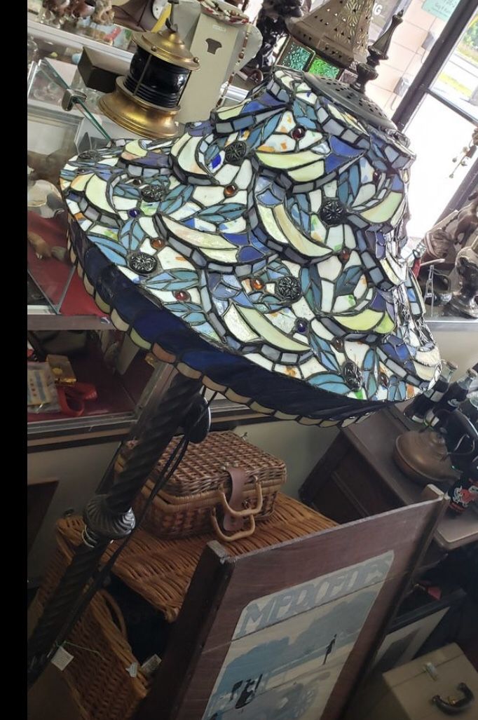 Five foot lamp with intricate glass shade