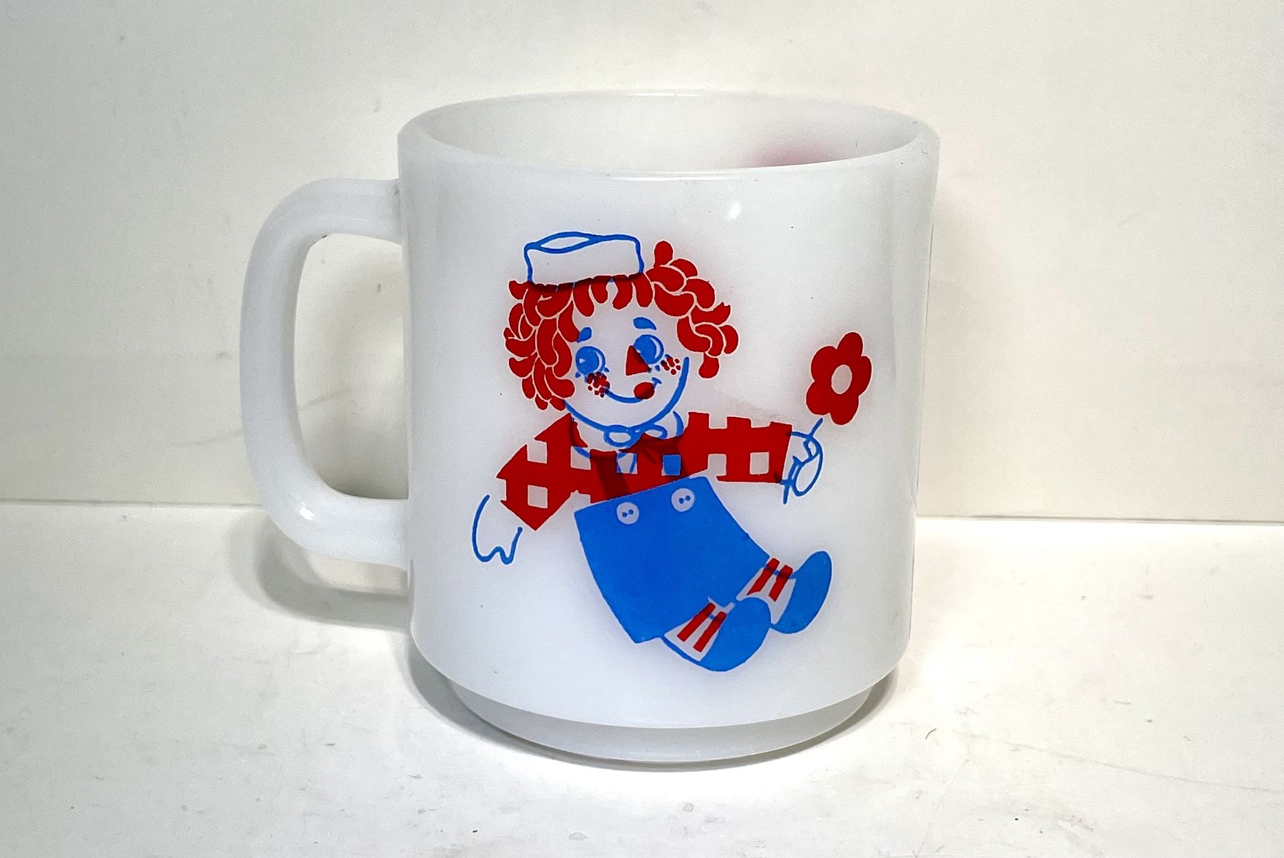 Raggedy Ann and Andy milk glass mug