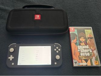 Nintendo Switch Lite + Accessories