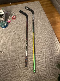 Two hockey sticks cost us over 250 Will sell for 120 each