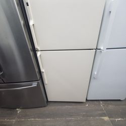 GE fridge with ice maker in white side 28 by 64 warranty $450..also baige 28 by 64 warranty $350