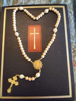 Catholic bible.Good condition.  Brand new beautiful rosary!