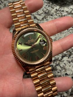 Rolex day date olive dial