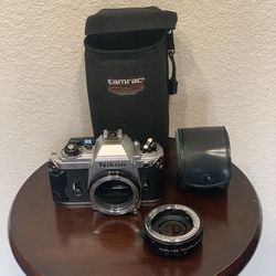 Nikon FG 35mm single-lens reflex SLR/Kenko Teleplus N-AFD 1.5x SHQ Teleconverter with 2 Cases