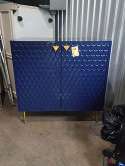Navy Blue Cabinet with Gold Legs and Handles
