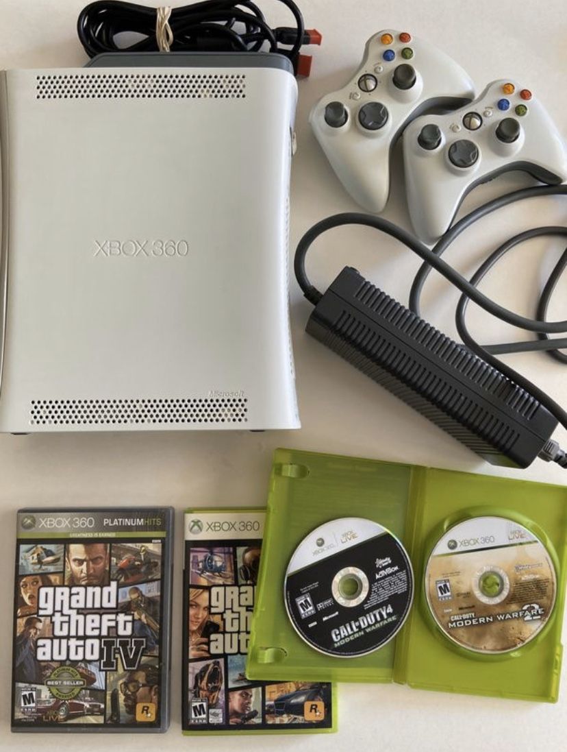 XBOX 360 (60 GB) with Controllers and Games