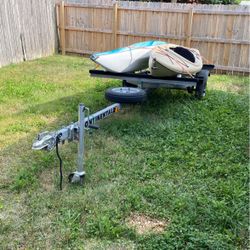 2 kayaks and trailer $1000 or best offer