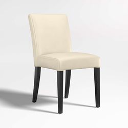 Crate and Barrel Lowe dining chairs ivory with black legs