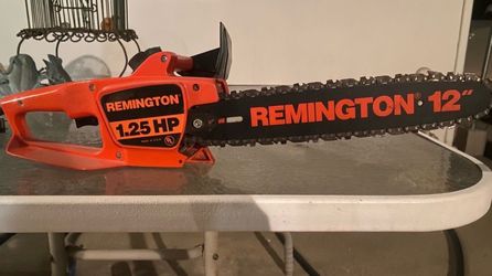 Vintage Remington 1.25 HP 12" electric chainsaw. Very Good Condition!