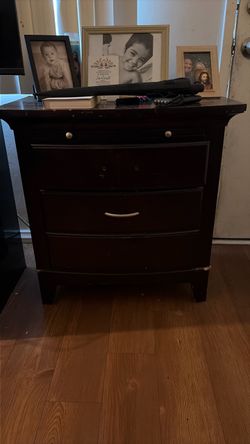Two wooden side tables