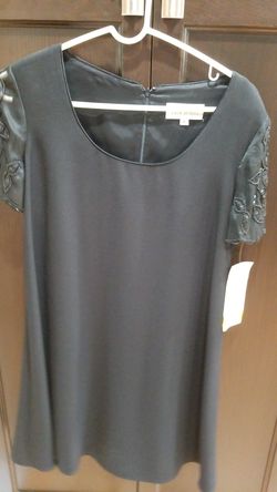Formal dresses and black holiday tops