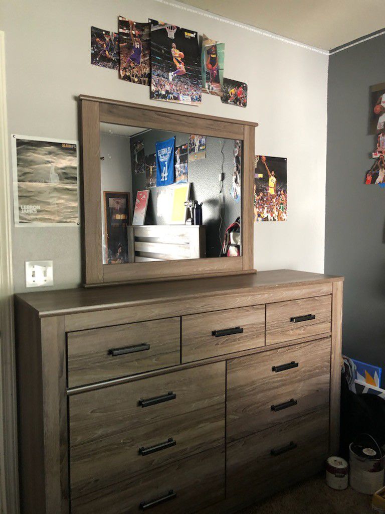 Dresser only used for 1 year not broken good condition only has 2 very small scratches $245 obo Mirror 38 By 33inches Dresser 61 Length42 Height
