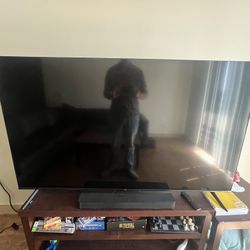 TCL 65 Inch 4 Series 4k UHD HDR Smart Roku Tv 