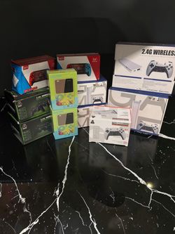 Mixed Lot of Handheld Game Consoles and Wireless Controllers