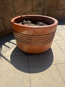 3x terracotta planters.  12 inches tall, 17 inch diameter