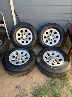 Chevy / GMC Stock Wheels 17” brand new tires