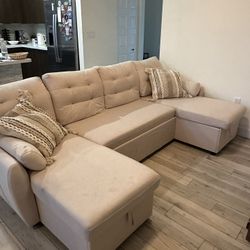 Modern sectional sofa with chaise and storage. 