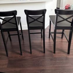 3 black bar stools