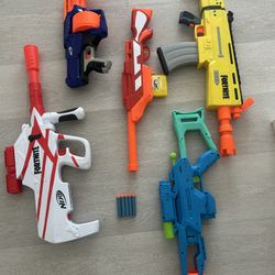 Five Nerf Guns + 5 Nerf Bullets