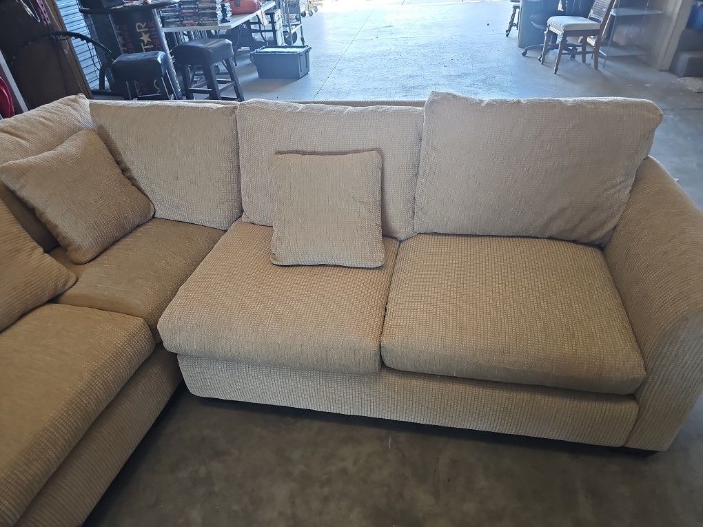 Couch sectional.
Goose down. Cushions