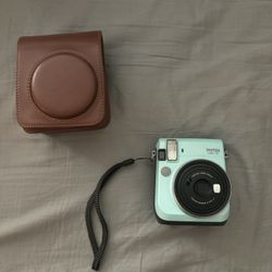 Polaroid Camera And Leather Case