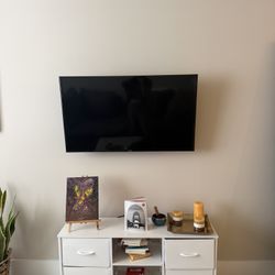 Move Out Sale: • TV stand + TV= $150