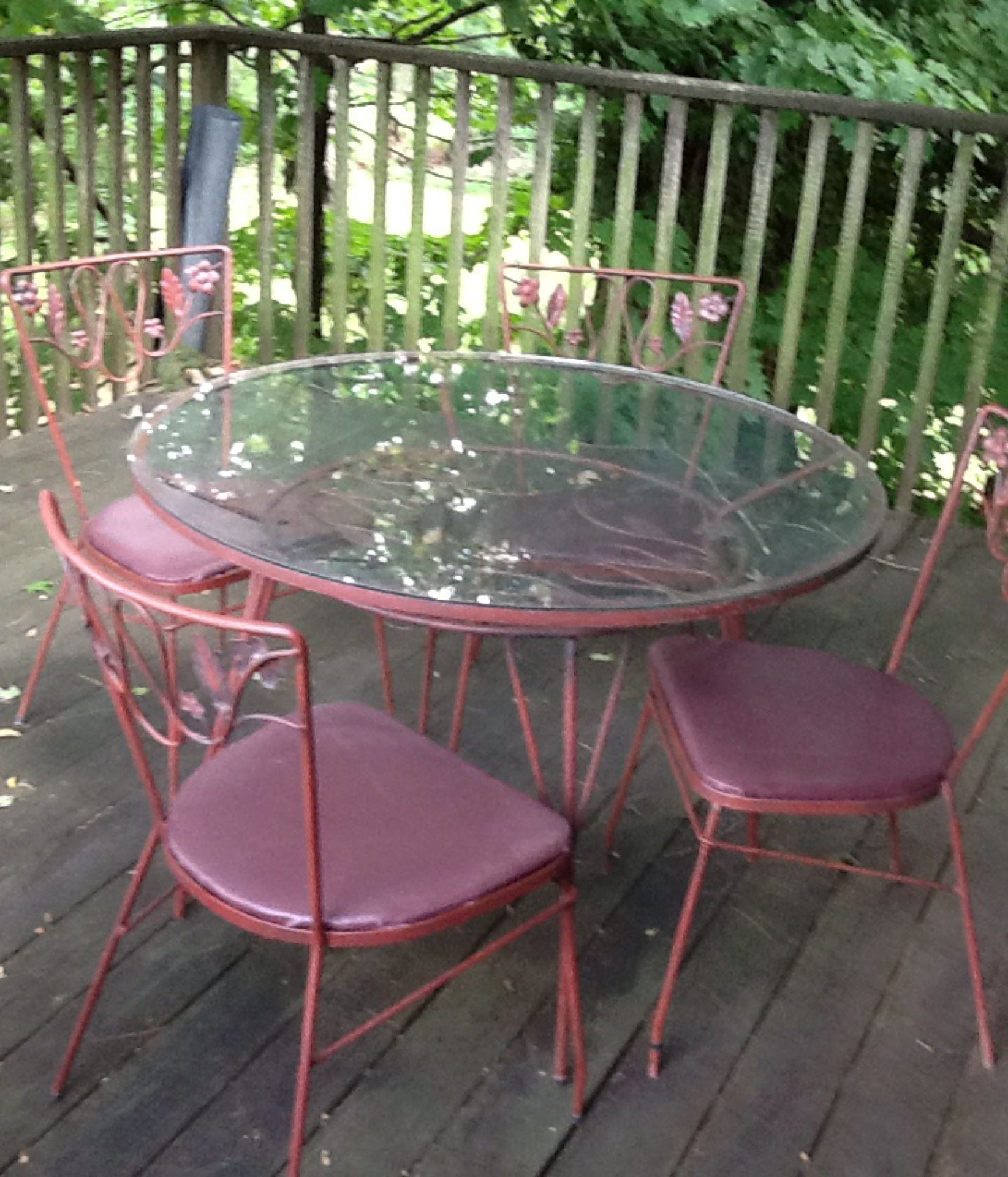 Outdoor Metal table with glass top and 4 metal chairs beautiful set