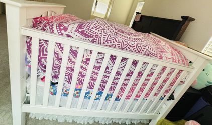 wood infant bed with mattress
