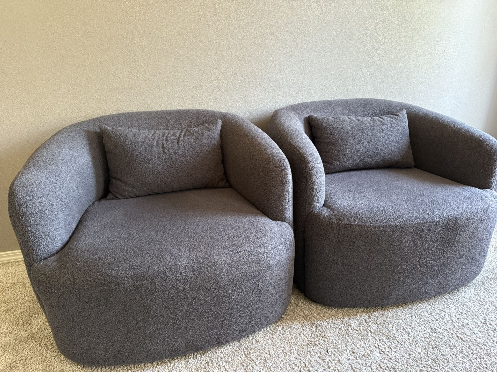 Modern swivel armchairs set.Set of 2