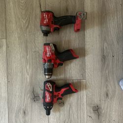 Milwaukee 18v Impact & 2 12 Volt Drills.