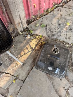 Used grill with grill utensils