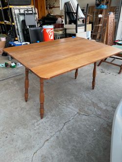 Wood pop out table