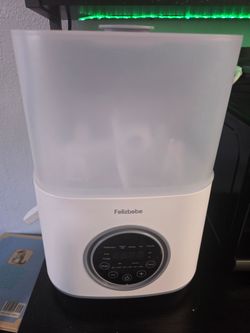 Bottle warmer and sterilizer *bonus detergent tablets*
