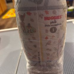 64 HUGGIES DIAPERS