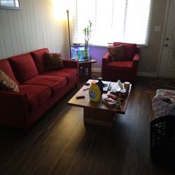 Three Seater Maroon Couch And Matching Chair With Accent Pillows