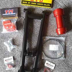 New 04-05 TRX450r +4 Swingarm, powder coated black, with our Red kit available new