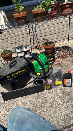 Vintage new John Deere chainsaw