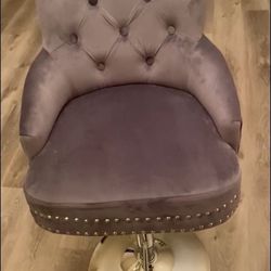 3 tufted gray stools