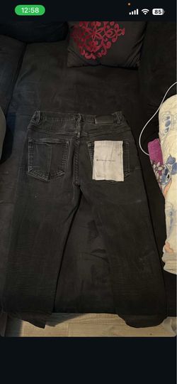 Purple jeans size 30 but it feels like a 31