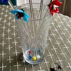 6 glass swizzle sticks/ cocktail sticks and 4 wine glass charms