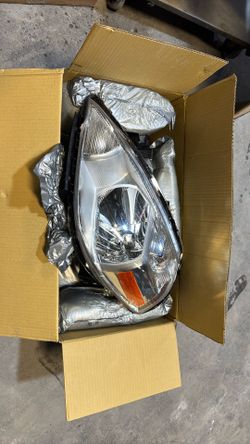 Brand New Versa Left Head Light