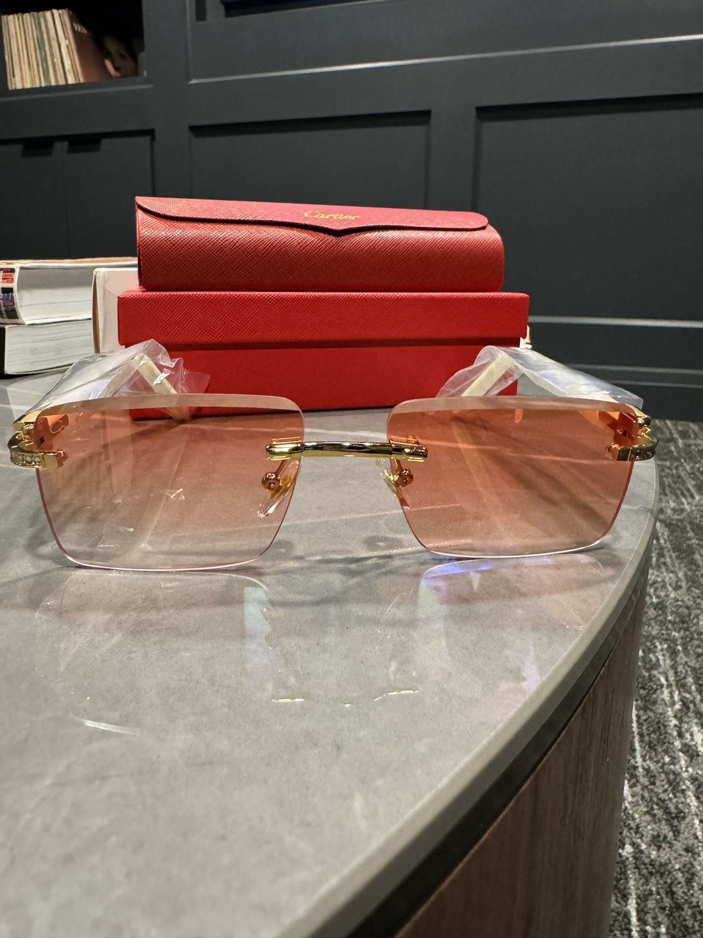 Red tint cartier glasses hotsell