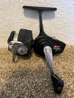 Vintage Mitchell 320 garcia spinning reel