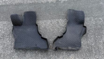 Used 2013 Ford E350 husky liners (driver and passenger only)