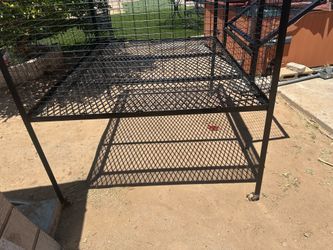 Raised pet cage w/ wheels and feed door