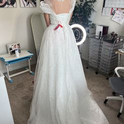 Wedding dress with pearl detailing size 4  to