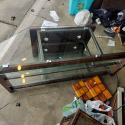 TV Stand In Good Condition (MAKE ME AN OFFER NOT FIRM ON PRICE)