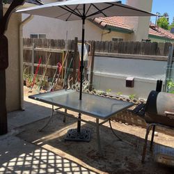 Patio table With umbrella and weight