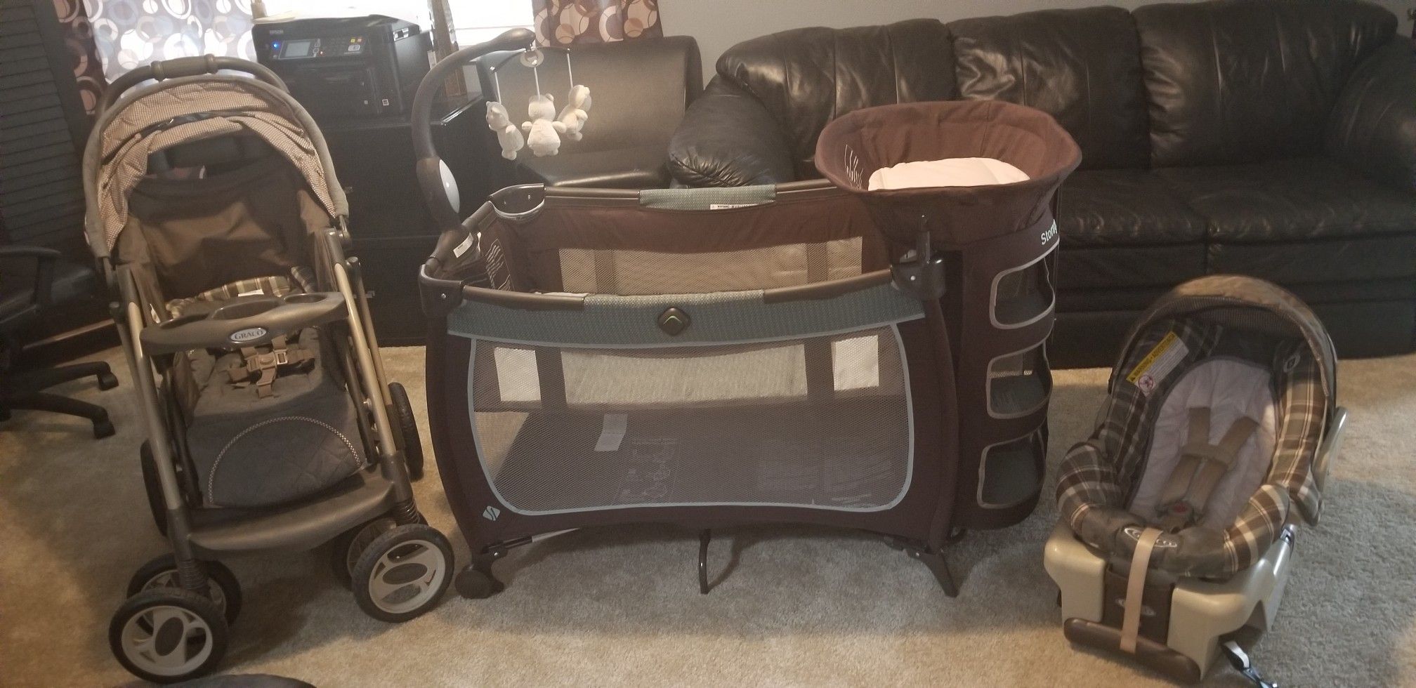 Matching stroller, pack and play and car seat