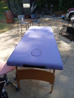 Massaging  table ,chair, paper